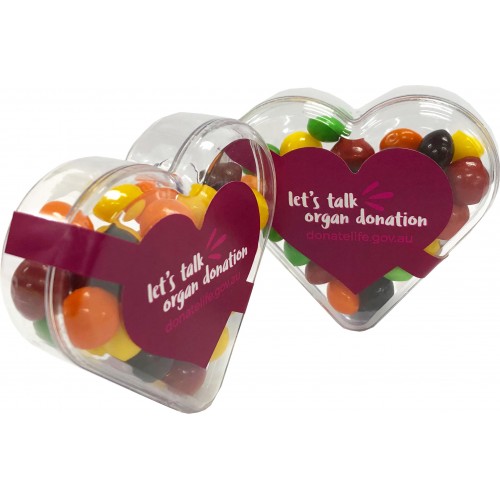 Acrylic Heart Container With Skittles 50g CACC030G Branded Front View Acrylic Heart Container With Skittles 50g CACC030G Branded Front View